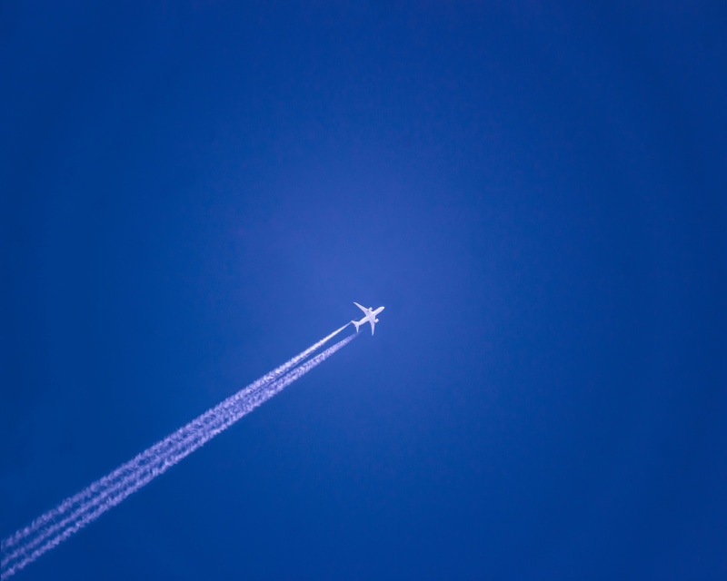 transportation, low angle view, no people, smoke, line, commercial airplane, aerospace industry, flying, sky, 4K, on the move, blue, directly below, plane