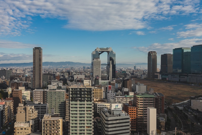 sky, tower, cloud - sky, outdoors, settlement, cityscape, travel, asium, urban, office building exterior, building exterior, aerial, day, city, urban skyline