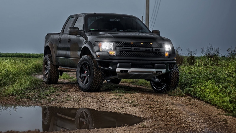 Ford Raptor, motor vehicle, stationary, mode of transportation, road, off-road vehicle, wheel, plant, trucks, black, mud, cab, sky, transportation, land vehicle