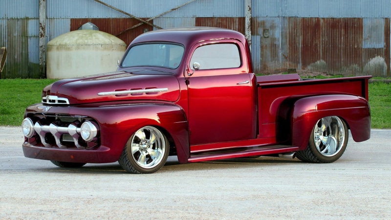 mode of transportation, collectors car, red, architecture, pickup, truck, tire, motor vehicle, personal land vehicle, stationary, street, metal, single