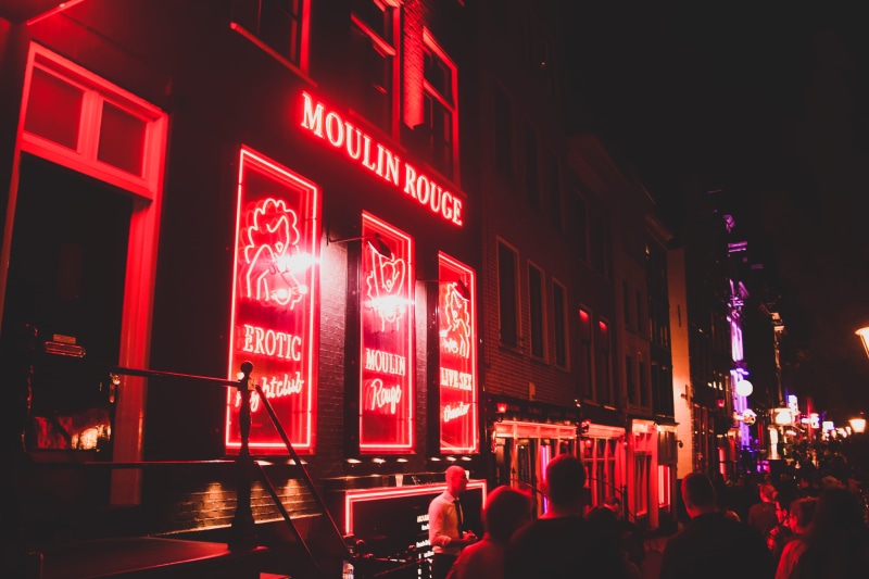 real people, red, street light, streetscape, communication, illuminated, neon light, city life, 5K, red lights district, crowd, streetlight, women, large group of people