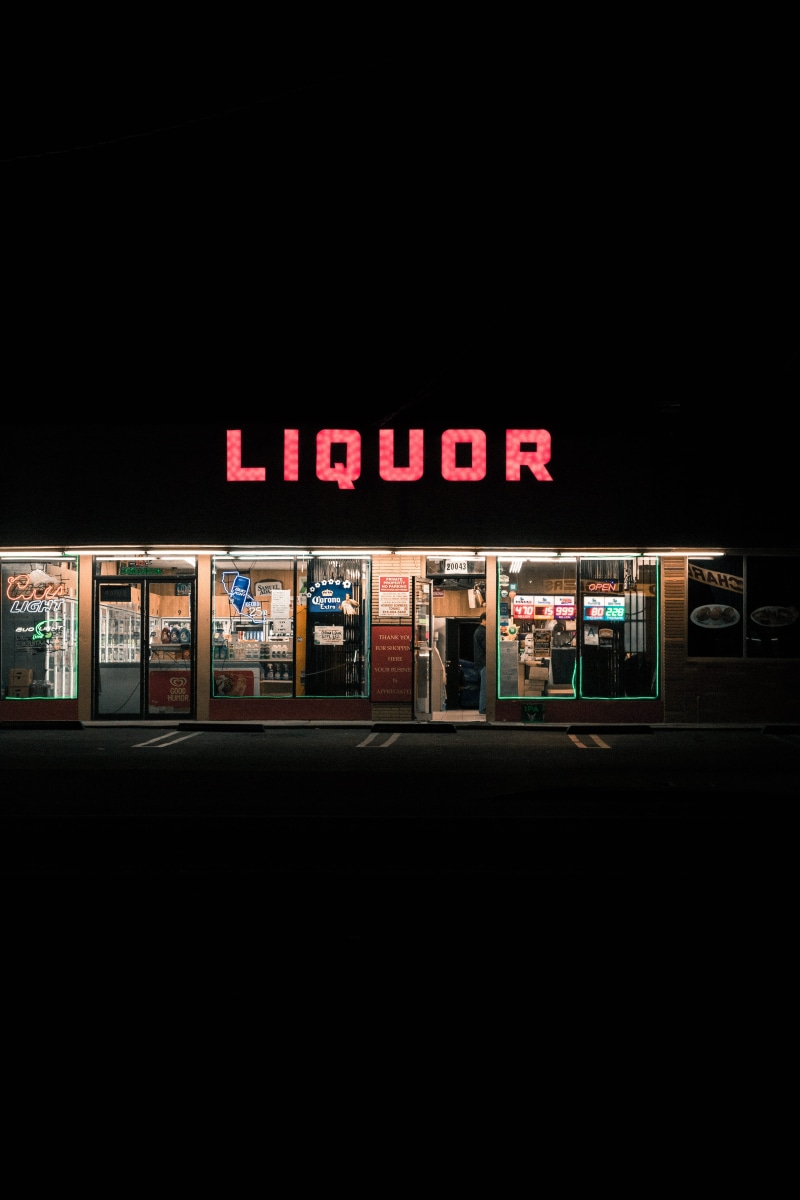 liquor store, commercial sign, copy space, old, no people, retro, dark, 5K, grimey, illuminated, building exterior, building, street, night photography