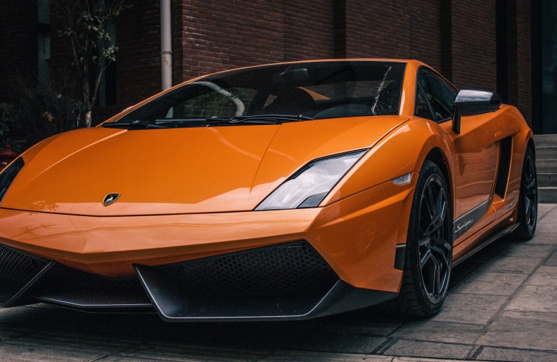 garage, front, car, motor, headlamp, mode of transportation, car door, automatic gear, design, headlight, sports car, view, building exterior, wheels, motor vehicle
