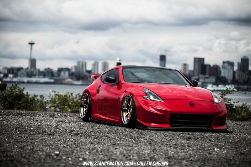 red, 720P, red cars, nature, land vehicle, Nissan 370Z, StanceNation, wealth, building exterior, sports, architecture, car, cloud - sky, motor vehicle