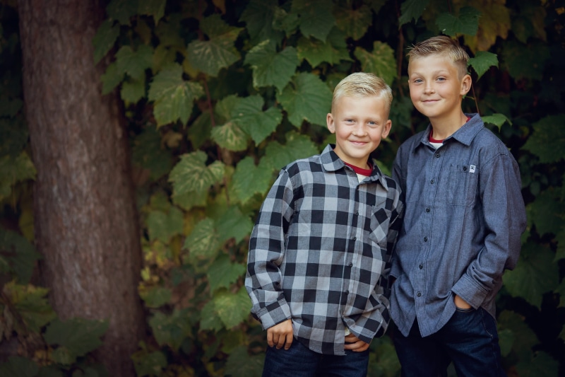 color Image, childhood, portrait, two, casual Clothing, Kids, nature, affectionate, innocence, checked pattern, green, tree, Brothers, smiling, trees, looking