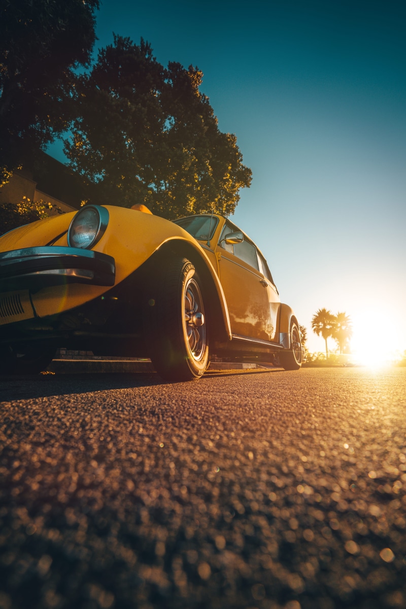 transportation, outdoors, sky, punch buggy, motor Vehicle, old-fashioned, mode of Transport, sunset, land Vehicle, sunflare, speed, classic, sports Car