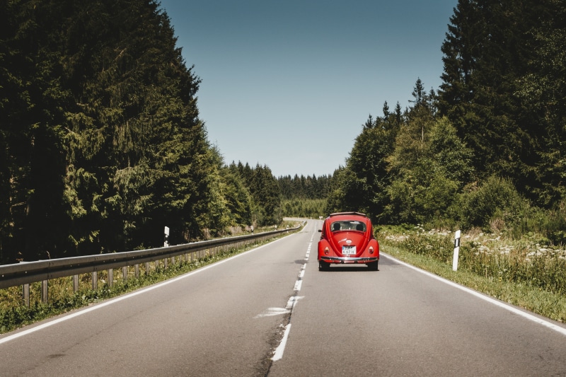 volkswagen, driving, asphalt, road, speed, motion, trees, scenics, wheel, blue, vehicle, 5K, vintage, bug, automobile, retro Styled, no People, street