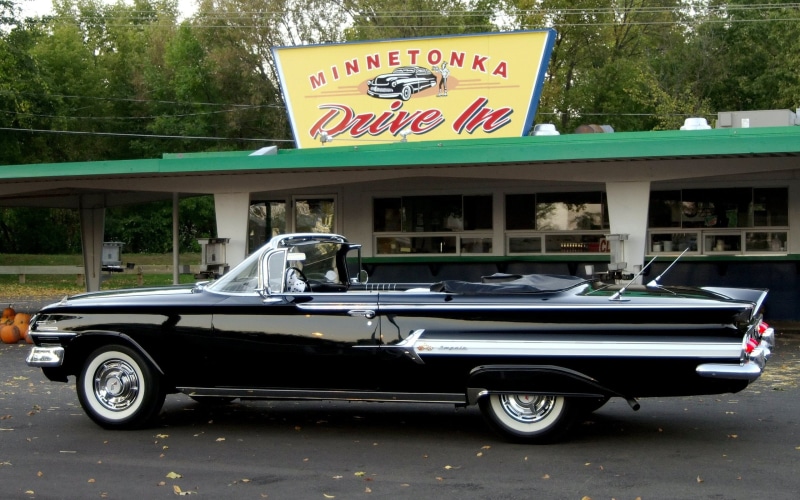 transportation, convertible, street, built structure, script, car, land vehicle, no people, day, western script, 2K, mode of transportation, black cars