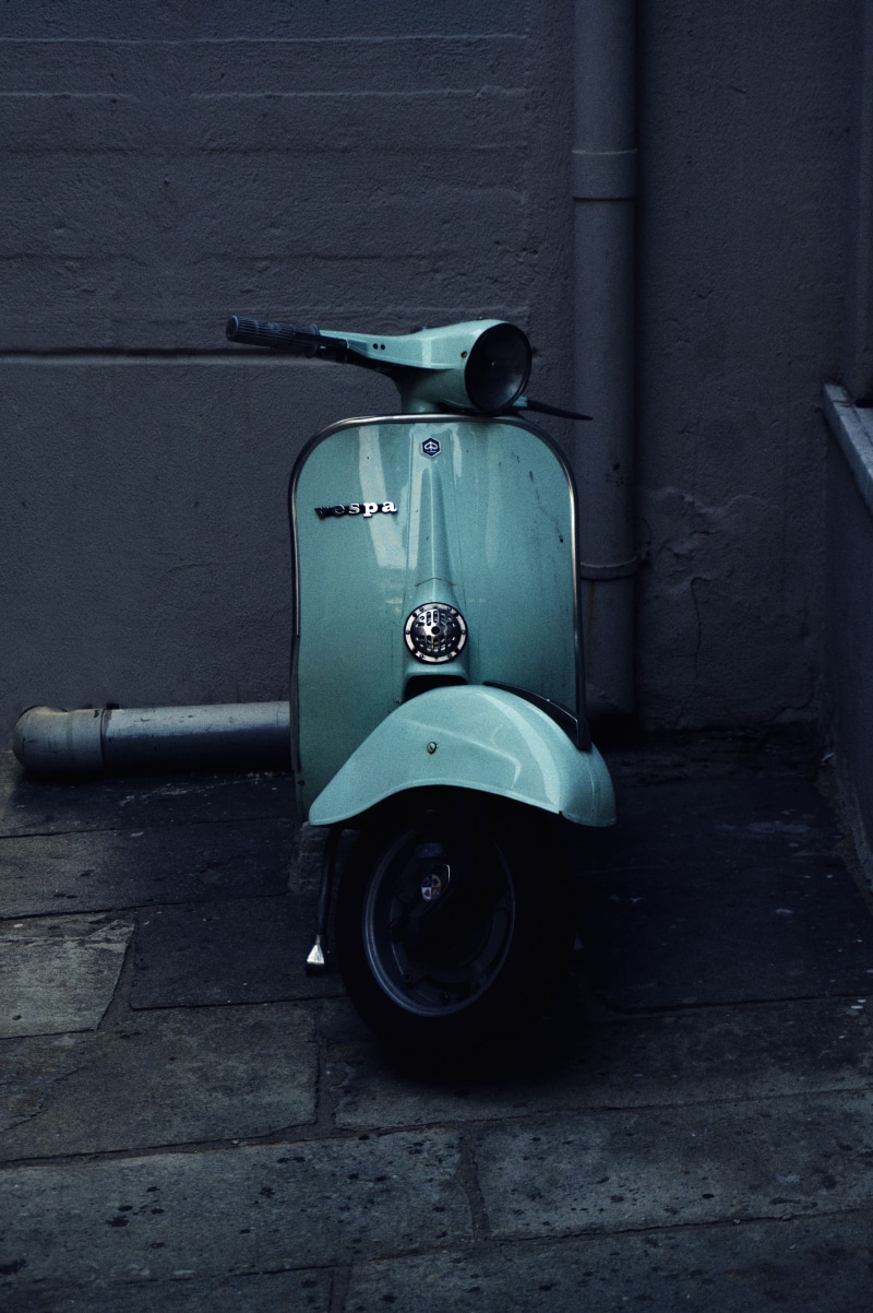 motor vehicle, design, road, motor, cool, no people, car, motorcycle, vespa, metal, street, wall - building feature, bike, cult, transportation, stationary
