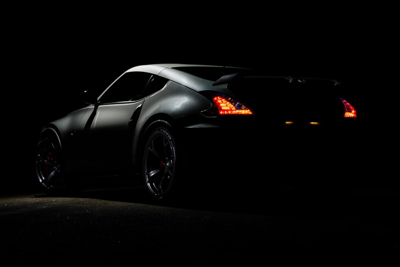 lighting equipment, sports, style, auto, road, design, copy space, sports car, travel, illuminated, motor vehicle, indoors, automotive, gray, tail lights