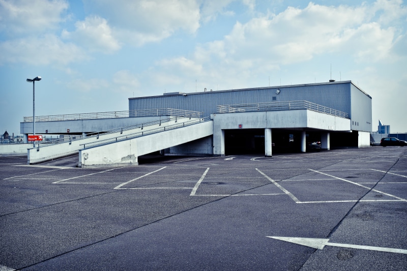 day, airport, alternate space, bleak, built structure, transportation, parking level, architecture, 5K, garage, no people, cloud - sky, mark, flat, park