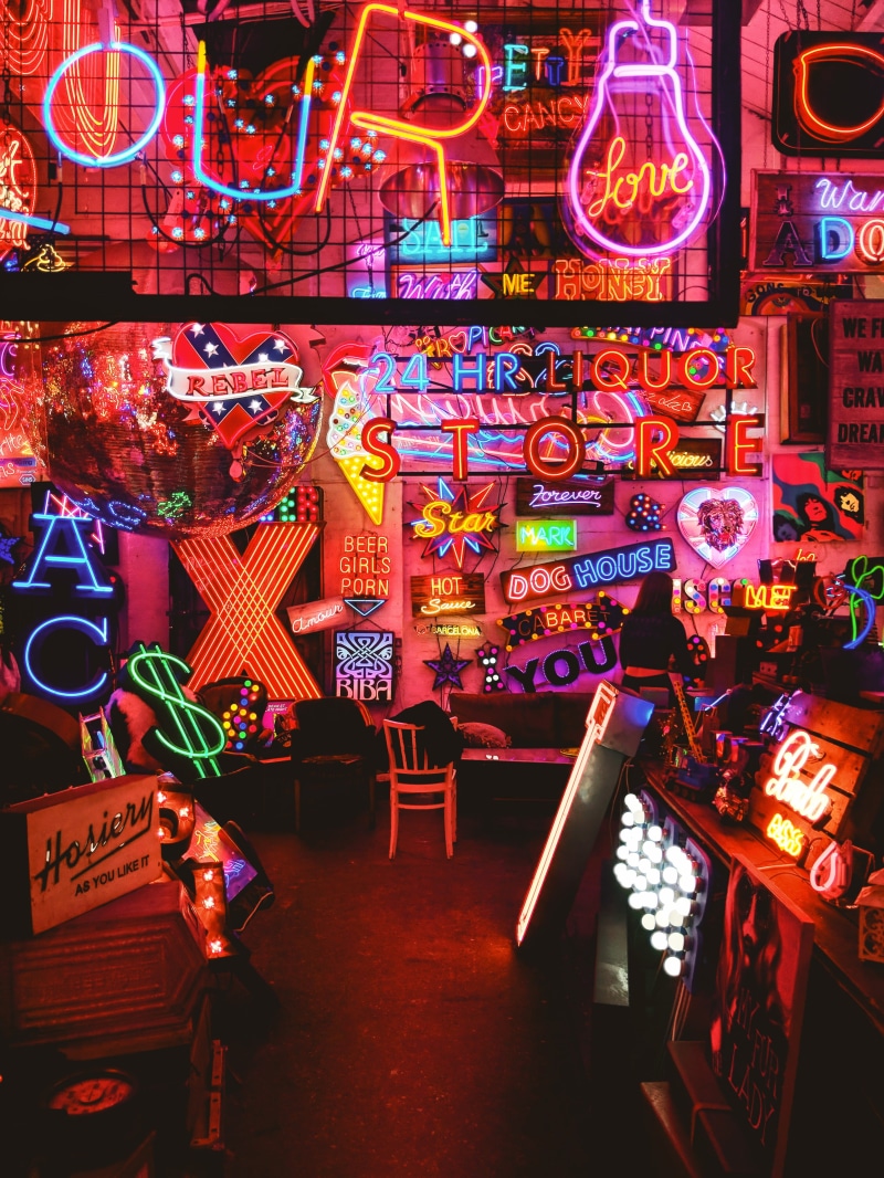 dark, colourful, architecture, arrangement, furniture, communication, light, indoors, contrast, arcade game machine, for sale, multi colored, signage, lighting equipment