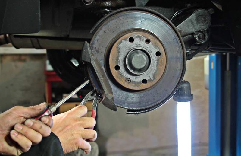 shopping, human body part, tire, brake disc, auto mechanic, day, check, exchange, close-up, hand, auto repair, mechanic, real people, mode of transportation