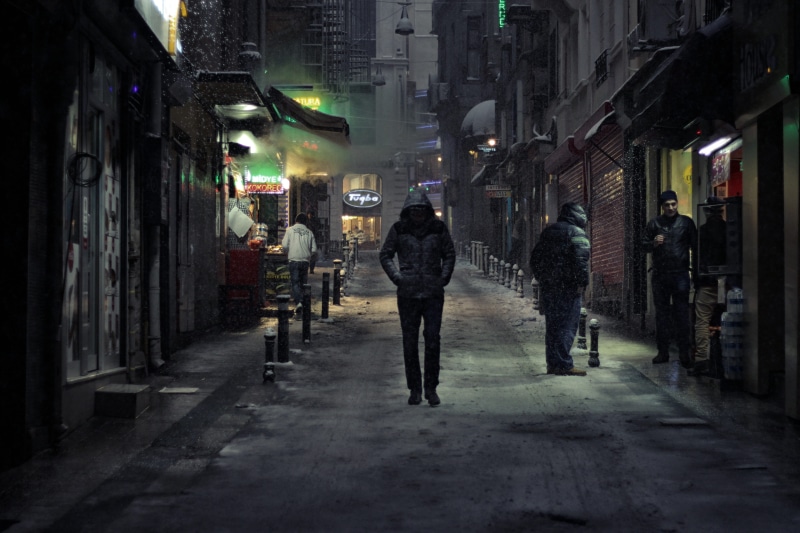snow, building, night, gloomy, men, city, women, rear view, illuminated, city life, lonely, concrete, alone, dark, adult, real people, built structure