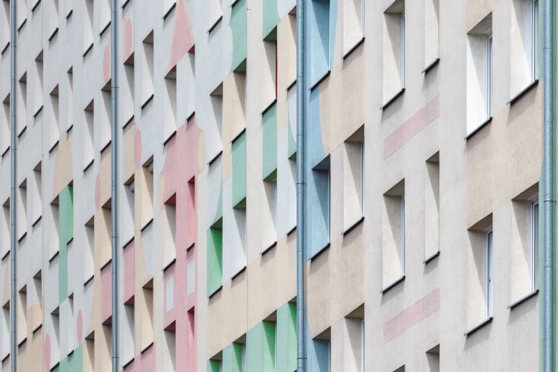 pastel, building exterior, modern, large group of objects, highrise, no people, cityscape, 5K, low angle view, window, backgrounds, windowpane, repetition