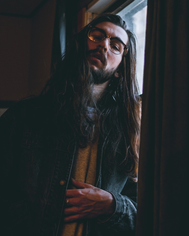 dream, looking, windowpane, one person, standing, hairstyle, male, portrait, casual clothing, young women, long hair, caucasian, lifestyles, window, indoors