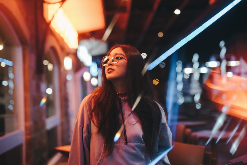 emotion, glasses, lifestyles, beautiful woman, sleeved, building, happiness, hairstyle, enjoyment, eyeglasses, smiling, jacket, women, female, window, glow