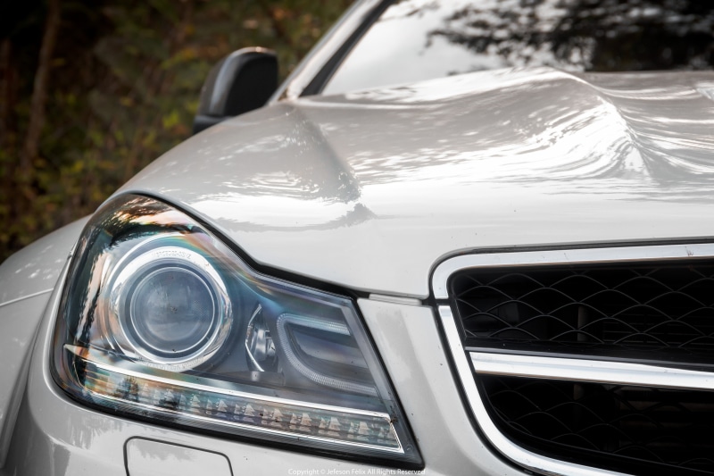 chrome, headlight, no people, land vehicle, day, reflection, car, luxury, close-up, motor vehicle, Mercedes-Benz, mode of transportation, 5K, Mercedes-Benz C63 AMG