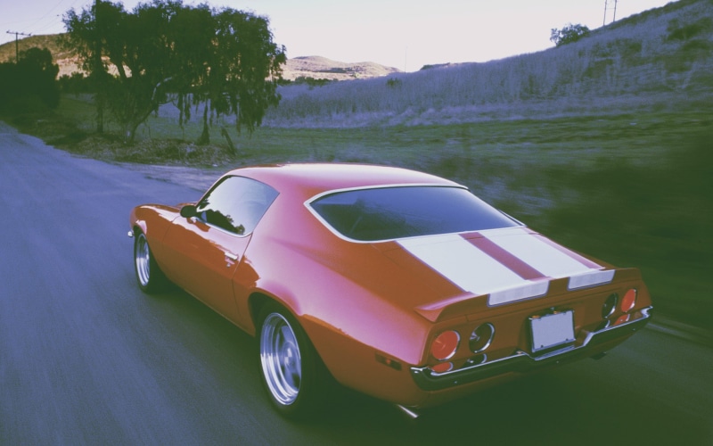 mode of transportation, retro styled, day, travel, motor vehicle, no people, stationary, vintage car, land vehicle, road trip, plant, nature, water, Chevrolet Camaro Z28