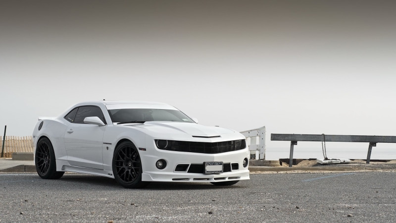 car, clear sky, racecar, nature, sports car, sky, retro styled, no people, wealth, camaro, stationary, white color, luxury, outdoors, copy space, parking