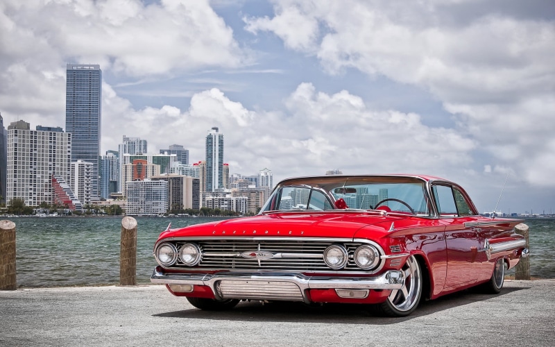 city, skyscraper, cityscape, nature, building, day, vehicle, sky, oldtimers, red cars, office building exterior, motor vehicle, mode of transportation