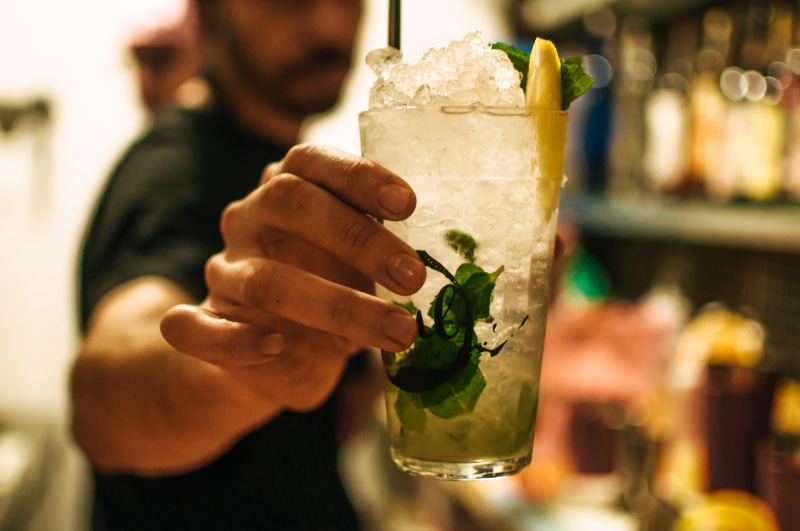 alcohol, bar - drink establishment, human body part, ice, nightlife, glass, bar, cold temperature, adult, herb, mint leaf - culinary, happy hour, refreshment