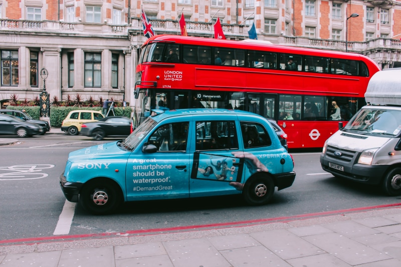 street, kingdom, bus, flashy, city, telephone booth, text, city street, red, england, motor vehicle, architecture, 5K, vehicle, building exterior, english