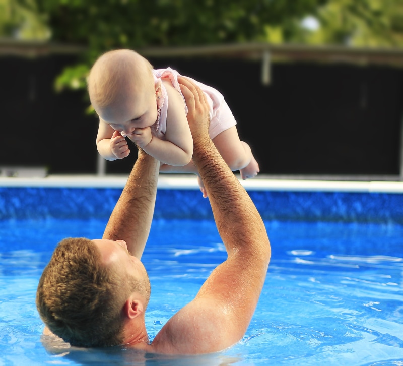 parent, blue, boys, faytime, water, man, young, family, playing, happy, toddler, focus on foreground, father, cheerful, innocence, caucasian Ethnicity