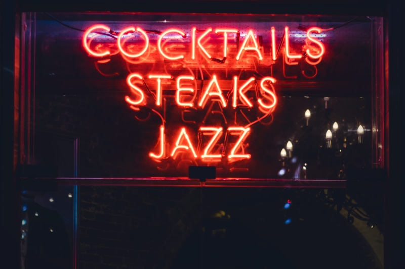 lighting equipment, steaks, architecture, building exterior, sign, no people, information, jazz, commercial sign, bar, communication, dining, marketing