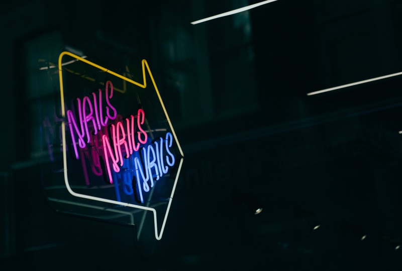 yellow, communication, pink, arrow, dark, close-up, business, lighting equipment, marketing, consumerism, illuminated, store, blue, electricity, nails
