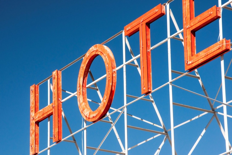 advertising, illuminated advertising, sky, font, blue, clear sky, neon, low angle view, letters, illuminated, sunny, tourism, architecture, communication