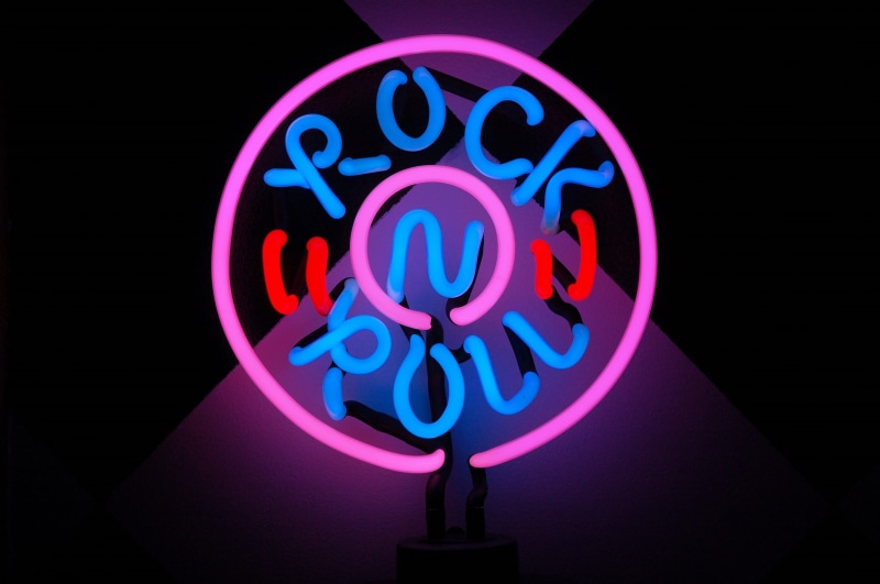 roll, outdoors, Sign, 2K, black background, light, studio shot, pink color, sign, pink, communication, glowing, blue, rock, Rock And Roll, night, neon colored