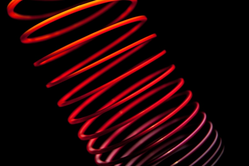 copy space, black Background, captured, no people, electrical equipment, selective focus, image, illuminated, fiber optic, flexibility, studio shot, abstract
