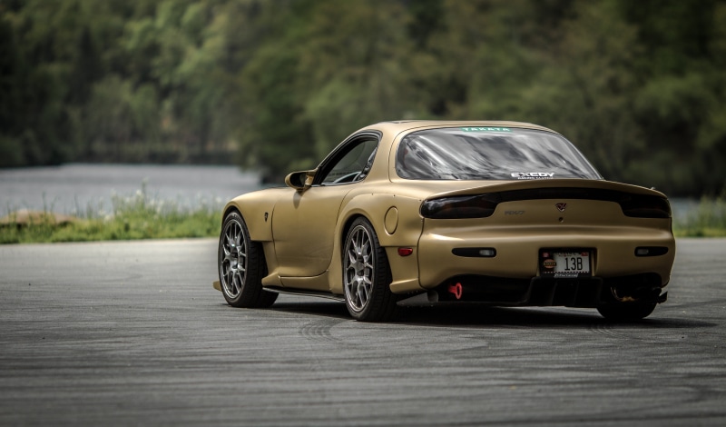 gold, coupe, travel, toy car, focus on foreground, selective focus, toy, tree, transportation, no people, Mazda, 5K, car, land vehicle, nature, stationary
