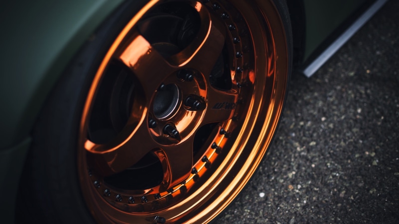 close-up, focus on foreground, car, wheel, high angle view, arts culture and entertainment, technology, no people, drink, 2K, night, alcohol, illuminated
