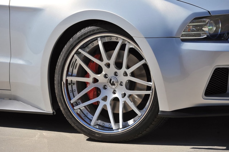 gray, transportation, silver cars, vehicle part, stationary, mode of transportation, land vehicle, silver colored, tires, car, wealth, geometric shape