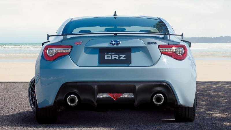 text, outdoors, 1080P, motor vehicle, land, number, mode of transportation, beach, no people, motion, car, Subaru BRZ, capital letter, sea, sky, land vehicle