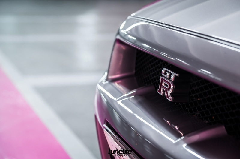 Nissan Skyline GT-R R35, studio shot, transportation, day, communication, retro styled, Nissan Skyline GT-R R34, text, close-up, motor vehicle, focus on foreground