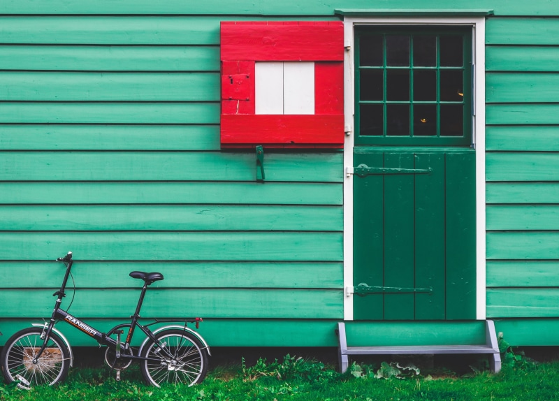 bicycle, folding, window, house, wall - building feature, stationary, closed, land vehicle, zaanse schan, netherlands, beside, wood - material, vehicle