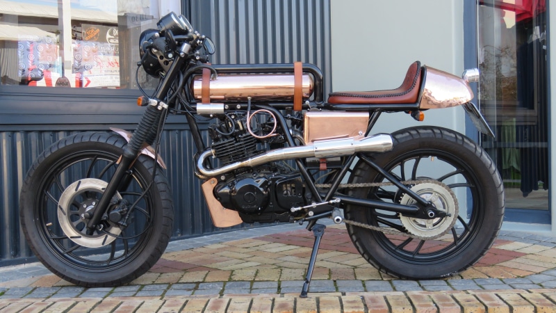motorcycle, land vehicle, tire, Motor, motorbike, street, Wheel, orthopedic equipment, Power, helmet, footpath, architecture, travel, vehicle, mode of transportation