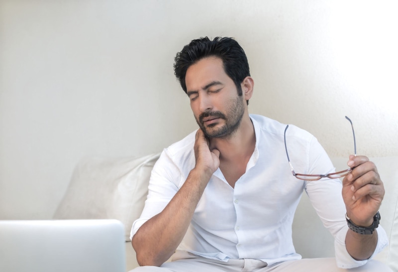 young adult, corporate, massage, mid adult men, therapist, furniture, corporate male, beard, neck, real people, business, expression, sitting, occupation