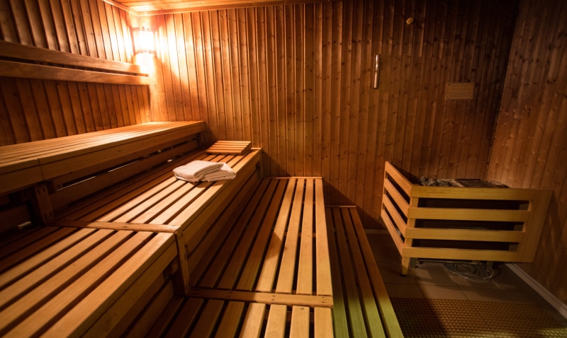 ceiling, heat, illuminated, wood, no people, architecture, leisure, furniture, domestic room, seat, striped, chair, wood paneling, wooden, wood sauna, wall - building feature