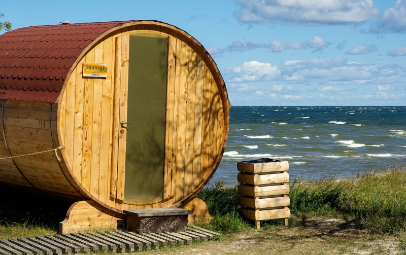 sauna, sky, beach, wood - material, no people, baltic sea, beauty in nature, sea, water, green color, cloud - sky, horizon, estonia, barrel, horizon over water