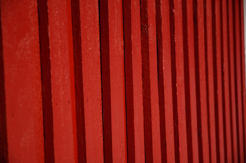 2K, day, indoors, boundary, wall - building feature, stage - performance space, sauna, architecture, red wall, red ocher, stage, board wall, no people