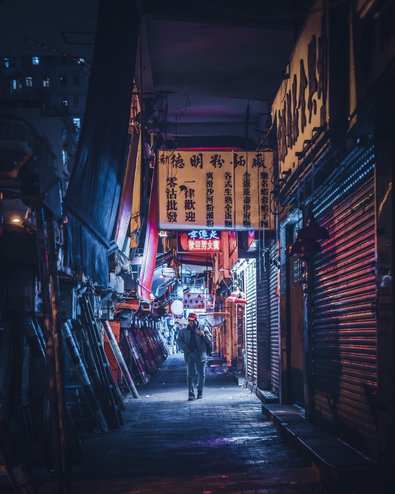 sham shui po, neon, night, sidewalk, non-western script, man, building exterior, real people, tarmac, jacket, path, built structure, rear view, architecture