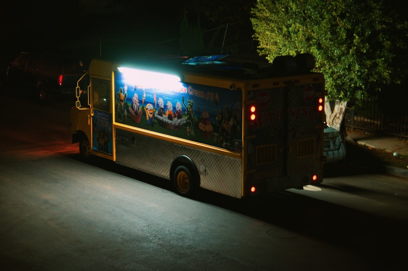 bus, fire department, illuminated, tree, travel, light, city, public transportation, car, no people, nightlife, road, vehicle, night, lighting equipment