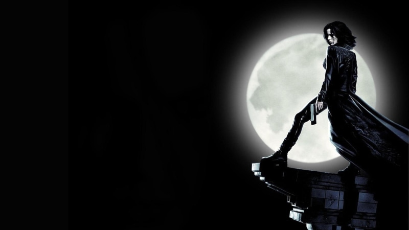 gun, Underworld, mid adult, night, woman, planetary moon, human body part, black background, one person, Kate Beckinsale, three quarter length, copy space