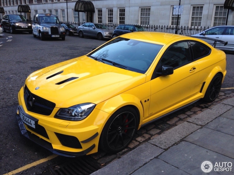 480P, day, no people, Mercedes-Benz C63 AMG, street, land vehicle, city street, yellow, stationary, built structure, car, mode of transportation, yellow taxi