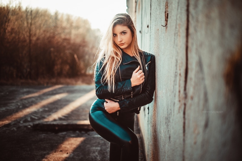 black clothing, women outdoors, Sonja, portrait, 1080P, women, leather leggings, model, wet clothing, leather jackets, Reinhard Fuerstberger, blonde, wall