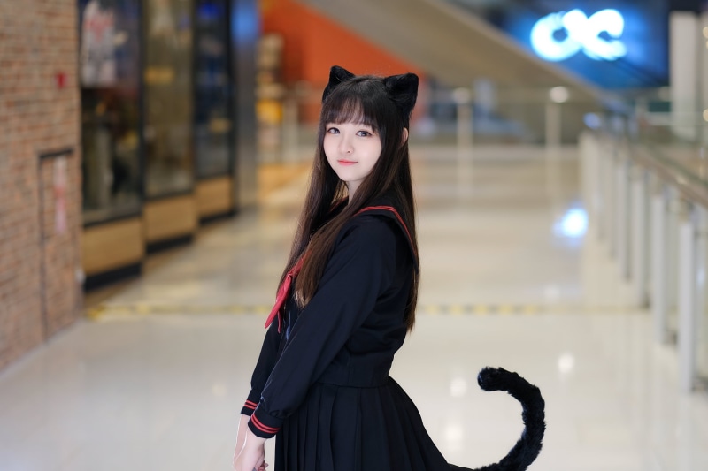 cat ears, smiling, side view, sailor uniform, portrait, 2K, women, brunette, school uniform, indoors, women indoors, tail, Asian, depth of field, looking at viewer